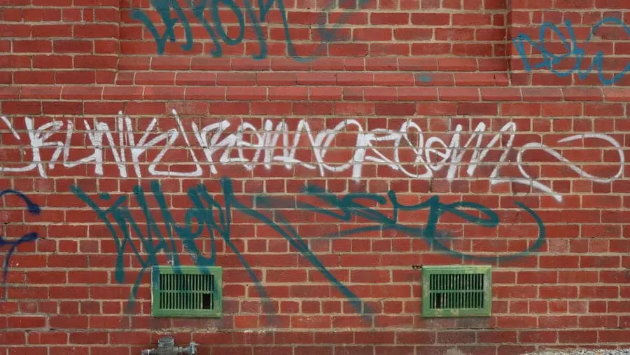 Graffiti on a brick wall.