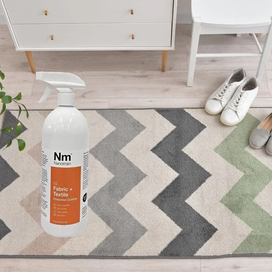 Fabric Waterproofing Spray 1 L on a patterned rug