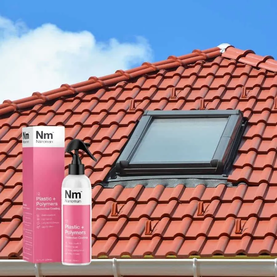 Plastics Coating 250 ml and box on a tiled roof with a skylight