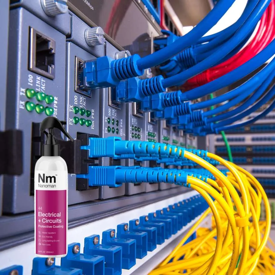 Electrical + Circuits in front of a network switch with patch cables